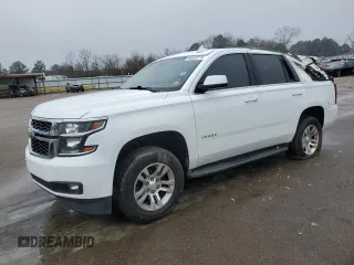 2020 Chevrolet Tahoe LT z VIN 1GNSKBKC1LR230885, wystawiony jako Copart lot #46532275 z przebiegiem 103 900 mil mil oraz Szkoda całkowita • Salvage title. Historia ofert i sprzedaży dostępna na DreamBid. Obrazek 1.