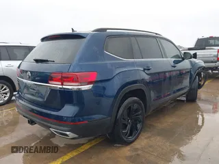 2023 Volkswagen Atlas SE z VIN 1V2WR2CA3PC507742, wystawiony jako IAAI lot #41282782 z przebiegiem 26 052 mil mil oraz . Historia ofert i sprzedaży dostępna na DreamBid. Obrazek 4.