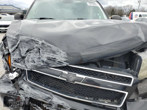 2008 Chevrolet Tahoe LS with VIN 1GNFC13C18R137475, listed as a Copart auction lot 49703255 with 126,667 mi miles and Salvage title. Bid and sale history available at DreamBid. Image 14.
