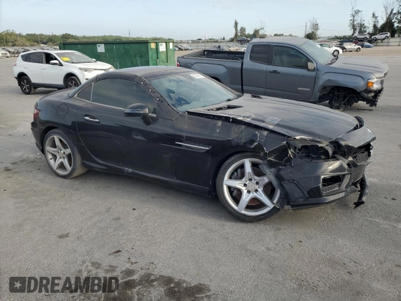 2013 Mercedes-Benz SLK 250 with VIN WDDPK4HA9DF061496, listed as a Copart auction lot 55575215 with 94,123 mi miles and Salvage Title. Bid and sale history available at DreamBid. Image 4.