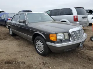 1987 Mercedes-Benz 560 with VIN WDBCA39D7HA322057, listed as a Copart auction lot 83717904 with 246,060 mi miles and Clean Title. Bid and sale history available at DreamBid. Image 4.