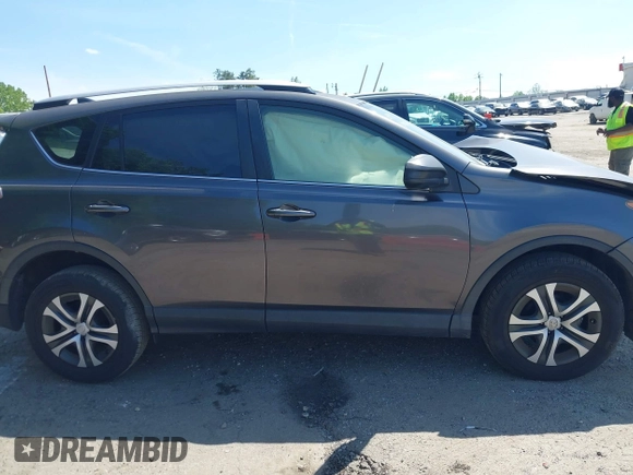 2016 Toyota RAV4 LE with VIN JTMZFREV7GJ086149, listed as a IAAI auction lot 42064251 with 90,104 mi miles and . Bid and sale history available at DreamBid. Image 13.