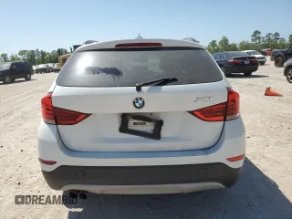 2013 BMW X1 28i z VIN WBAVM1C50DVW41615, wystawiony jako Copart lot #51329525 z przebiegiem 120 642 mil mil oraz Szkoda całkowita • Salvage title. Historia ofert i sprzedaży dostępna na DreamBid. Obrazek 6.