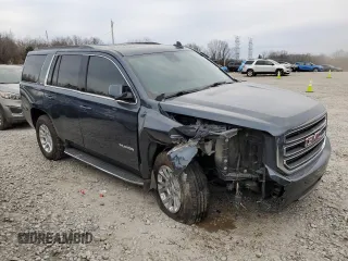 2020 GMC Yukon SLT with VIN 1GKS1BKC3LR259725, listed as a Copart auction lot 43036055 with 125,347 mi miles and Salvage Title. Bid and sale history available at DreamBid. Image 4.