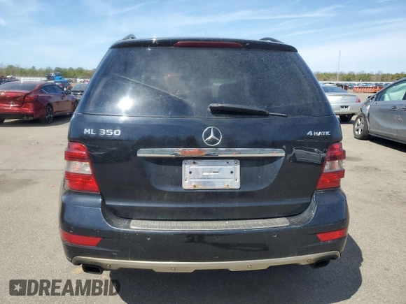 2009 Mercedes-Benz M 350 with VIN 4JGBB86E59A497604, listed as a Copart auction lot 54211915 with 202,098 mi miles and Clean Title. Bid and sale history available at carsss.com. Image 6.
