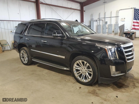 2015 Cadillac Escalade Luxury with VIN 1GYS4MKJ2FR737743, listed as a Copart auction lot 56935494 with 98,300 mi miles and Salvage Title. Bid and sale history available at carsss.com. Image 4.