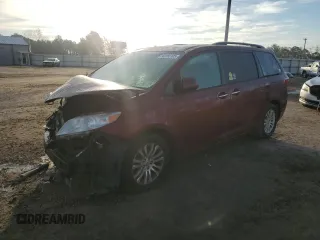 2016 Toyota Sienna XLE with VIN 5TDYK3DC3GS701688, listed as a Copart auction lot 43155105 with 208,227 mi miles and Salvage title. Bid and sale history available at DreamBid. Image 1.