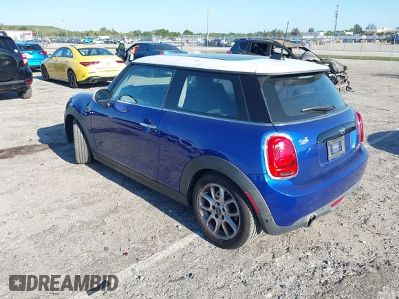 2019 MINI Hardtop Cooper with VIN WMWXP5C52K2H97728, listed as a IAAI auction lot 42026666 with 61,464 mi miles and . Bid and sale history available at DreamBid. Image 3.