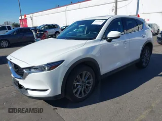2021 Mazda CX-5 Grand Touring with VIN JM3KFBDM6M0483135, listed as a IAAI auction lot 41590430 with 33,466 mi miles. Bid and sale history available at carsss.com. Image 17.
