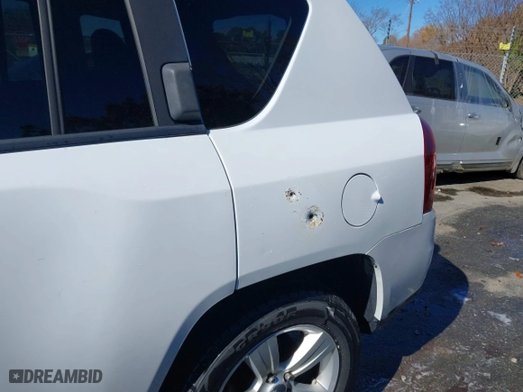 2016 Jeep Compass Sport with VIN 1C4NJDBB0GD617720, listed as a IAAI auction lot 41854195 with 97,961 mi miles. Bid and sale history available at carsss.com. Image 17.