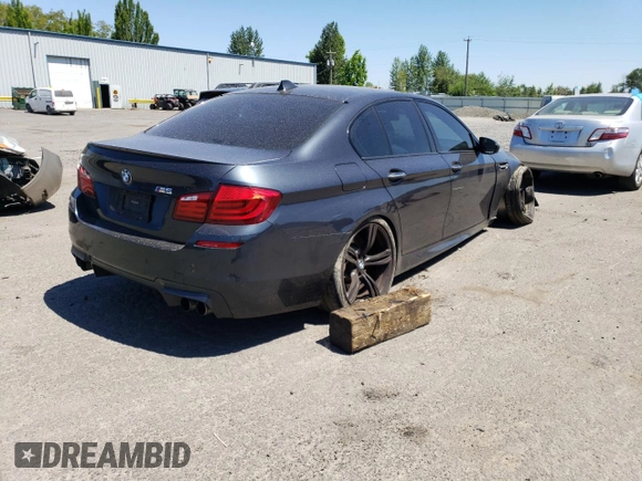2013 BMW M5 z VIN WBSFV9C50DC774172, wystawiony jako Copart lot #61990854 z przebiegiem Nie podano mil oraz Szkoda całkowita • Salvage title. Historia ofert i sprzedaży dostępna na DreamBid. Obrazek 3.
