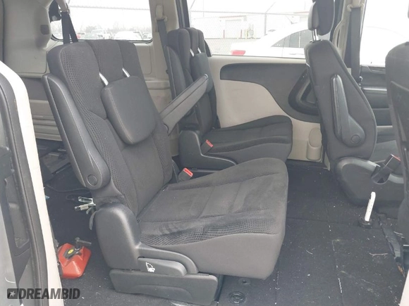 2019 Dodge Grand Caravan SE with VIN 2C4RDGBG2KR547780, listed as a IAAI auction lot 41538829 with 63,667 mi miles. Bid and sale history available at carsss.com. Image 8.