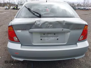 2005 Hyundai Accent GLS with VIN KMHCG35C85U354423, listed as a IAAI auction lot 41939445 with 134,952 mi miles. Bid and sale history available at carsss.com. Image 6.