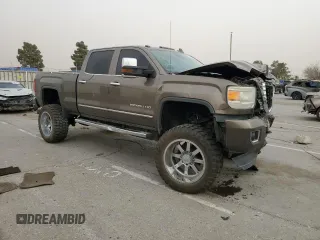 2015 GMC Sierra 2500HD available WiFi Denali with VIN 1GT120E86FF625876, listed as a Copart auction lot 45034795 with 134,185 mi miles and Salvage Title. Bid and sale history available at carsss.com. Image 4.