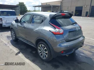 2015 Nissan Juke S with VIN JN8AF5MRXFT513258, listed as a IAAI auction lot 42213721 with 91,972 mi miles and . Bid and sale history available at DreamBid. Image 3.