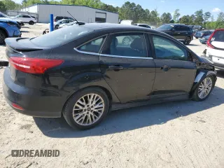 2017 Ford Focus Titanium with VIN 1FADP3J21HL260065, listed as a Copart auction lot 53165945 with 110,540 mi miles and Salvage title. Bid and sale history available at DreamBid. Image 3.