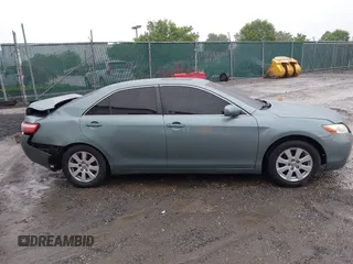 2007 Toyota Camry CE z VIN 4T1BE46K37U716769, wystawiony jako IAAI lot #42233779 z przebiegiem 166 265 mil mil oraz . Historia ofert i sprzedaży dostępna na DreamBid. Obrazek 13.