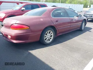 2000 Chrysler LHS with VIN 2C3HC56G1YH413455, listed as a IAAI auction lot 42038726 with 248,054 mi miles. Bid and sale history available at carsss.com. Image 4.