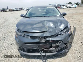 2024 Toyota Corolla LE with VIN JTDB4MEEXR3017537, listed as a Copart auction lot 60832825 with 23,779 mi miles and Salvage title. Bid and sale history available at DreamBid. Image 5.