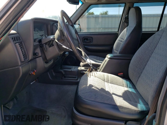 2000 Jeep Cherokee SE with VIN 1J4FF28S7YL257350, listed as a Copart auction lot 62320544 with 197,887 mi miles and Clean Title. Bid and sale history available at carsss.com. Image 7.