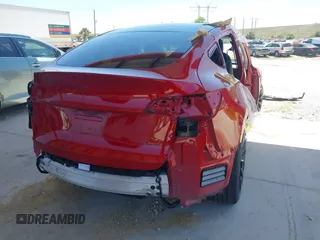 2020 Tesla Model Y Long Range with VIN 5YJYGDEE0LF029496, listed as a IAAI auction lot 41977695 with 47,958 mi miles and . Bid and sale history available at DreamBid. Image 16.