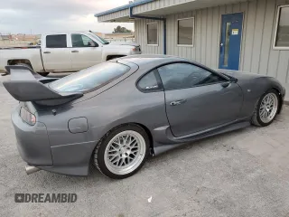 1996 Toyota Supra с VIN JZA800034162, выставлен на аукционе Copart как лот 80046394 с пробегом 86 285 миль миль и Чистый • Clean title. История ставок и продаж доступна на DreamBid. Изображение 3.