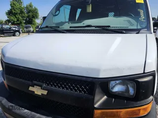 2015 Chevrolet Express Cargo with VIN 1GCWGFCF2F1262646, listed as a IAAI auction lot 42801576 with 165,952 mi miles and . Bid and sale history available at DreamBid. Image 2.