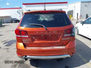 2014 Dodge Journey Crossroad with VIN 3C4PDDGGXET263930, listed as a IAAI auction lot 41826889 with 201,431 mi miles and . Bid and sale history available at DreamBid. Image 16.