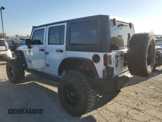 2018 Jeep Wrangler Unlimited Sport S with VIN 1C4BJWDG5JL846821, listed as a Copart auction lot 53310315 with 84,880 mi miles and Salvage title. Bid and sale history available at DreamBid. Image 2.