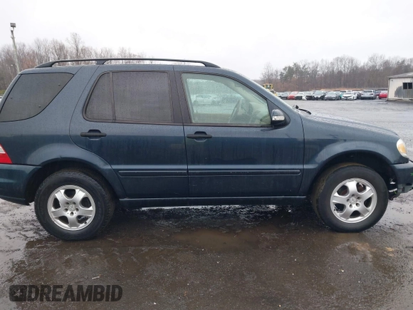 2003 Mercedes-Benz M-Class 3.2L with VIN 4JGAB54EX3A390987, listed as a IAAI auction lot 41482335 with 191,381 mi miles. Bid and sale history available at carsss.com. Image 13.
