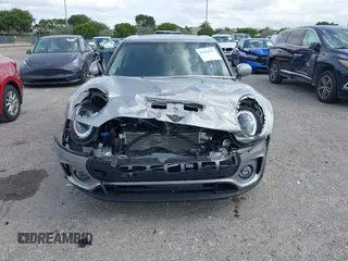 2023 MINI Clubman Cooper S with VIN WMWXJ1C03P2U08484, listed as a IAAI auction lot 41056651 with 12,948 mi miles. Bid and sale history available at carsss.com. Image 6.