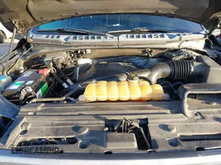 2015 Ford F-150 XLT with VIN 1FTEW1EG2FFC78324, listed as a IAAI auction lot 40708845 with 123,939 mi miles. Bid and sale history available at carsss.com. Image 10.