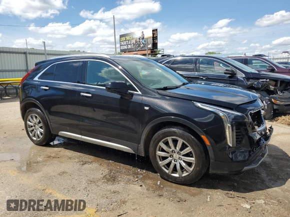2020 Cadillac XT4 AWD Premium Luxury with VIN 1GYFZDR47LF088070, listed as a Copart auction lot 42802985 with 102,777 mi miles and Salvage title. Bid and sale history available at DreamBid. Image 4.