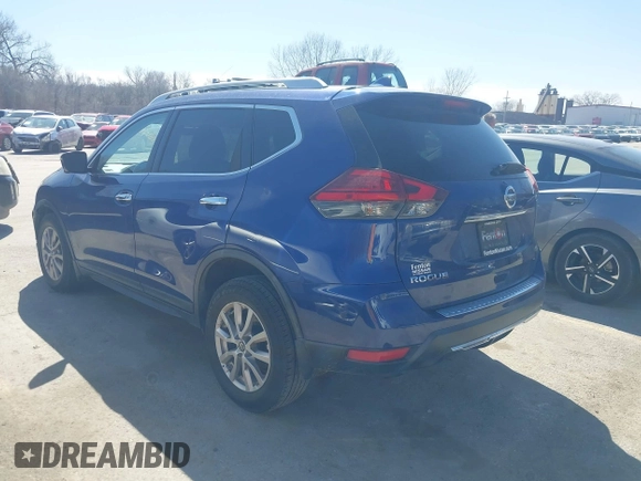 2017 Nissan Rogue SV with VIN KNMAT2MT2HP580785, listed as a IAAI auction lot 41811204 with 134,987 mi miles. Bid and sale history available at carsss.com. Image 3.