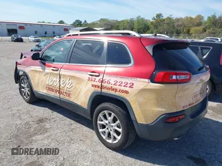 2015 Jeep Cherokee Latitude with VIN 1C4PJLCB0FW643402, listed as a IAAI auction lot 41811328 with 110,232 mi miles and . Bid and sale history available at DreamBid. Image 3.
