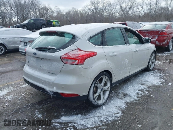 2015 Ford Focus Titanium с VIN 1FADP3N26FL232639, выставлен на аукционе IAAI как лот 41699403 с пробегом 86 870 миль миль и . История ставок и продаж доступна на DreamBid. Изображение 4.