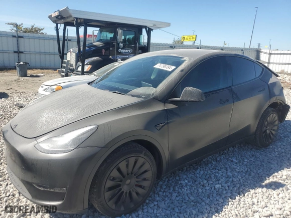 2023 Tesla Model Y Long Range with VIN 7SAYGDEE9PF706084, listed as a Copart auction lot 74799394 with 22,019 mi miles and Salvage Title. Bid and sale history available at carsss.com. Image 1.