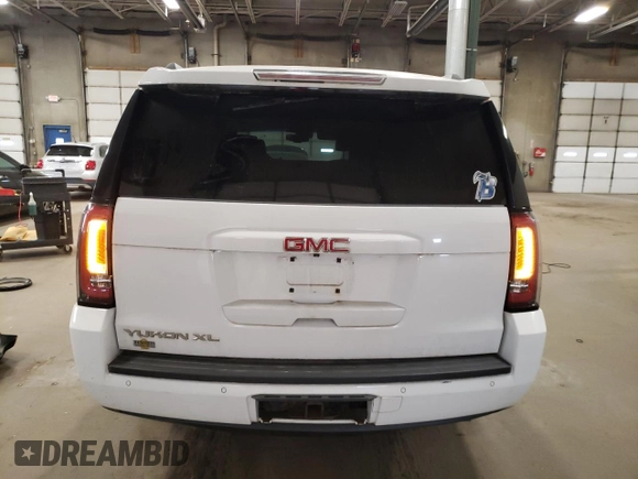 2015 GMC Yukon XL SLT z VIN 1GKS2HKC4FR545409, wystawiony jako Copart lot #55401425 z przebiegiem 214 848 mil mil oraz Czysty tytuł • Clean title. Historia ofert i sprzedaży dostępna na DreamBid. Obrazek 6.