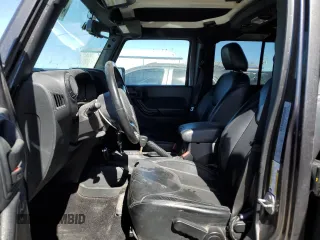2017 Jeep Wrangler Unlimited Sahara with VIN 1C4BJWEGXHL687691, listed as a Copart auction lot 46696505 with 99,443 mi miles and Salvage Title. Bid and sale history available at carsss.com. Image 7.