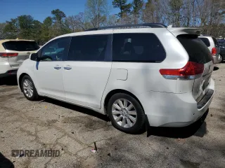 2011 Toyota Sienna XLE AAS with VIN 5TDYK3DC1BS013892, listed as a Copart auction lot 50239495 with 162,184 mi miles and Salvage Title. Bid and sale history available at DreamBid. Image 2.