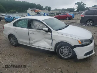 2014 Volkswagen Jetta SE with VIN 3VWD17AJ5EM365810, listed as a Copart auction lot 60676755 with 119,975 mi miles and Salvage title. Bid and sale history available at DreamBid. Image 4.