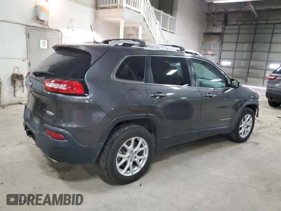 2015 Jeep Cherokee Latitude with VIN 1C4PJMCS0FW787988, listed as a Copart auction lot 52105155 with 117,254 mi miles and Salvage Title. Bid and sale history available at DreamBid. Image 3.