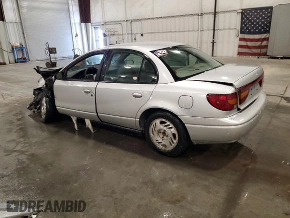 2002 Saturn SL z VIN 1G8ZK527X2Z267857, wystawiony jako Copart lot #46072975 z przebiegiem Nie podano mil oraz Szkoda całkowita • Salvage title. Historia ofert i sprzedaży dostępna na DreamBid. Obrazek 2.
