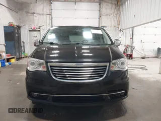 2014 Chrysler Town & Country Limited z VIN 2C4RC1GG0ER112673, wystawiony jako IAAI lot #42487731 z przebiegiem 107 207 mil mil oraz . Historia ofert i sprzedaży dostępna na DreamBid. Obrazek 12.