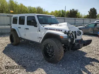 2021 Jeep Wrangler Unlimited Rubicon with VIN 1C4HJXFN3MW634045, listed as a Copart auction lot 52684805 with 34,133 mi miles and Clean Title. Bid and sale history available at DreamBid. Image 4.