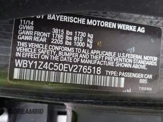 2014 BMW i3 with VIN WBY1Z4C50EV276518, listed as a IAAI auction lot 42631879 with 80,871 mi miles and . Bid and sale history available at DreamBid. Image 9.
