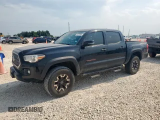 2019 Toyota Tacoma SR z VIN 3TMCZ5AN1KM195374, wystawiony jako Copart lot #57273305 z przebiegiem 96 458 mil mil oraz Szkoda całkowita • Salvage title. Historia ofert i sprzedaży dostępna na DreamBid. Obrazek 1.