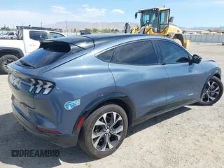 2021 Ford Mustang Mach-E Premium with VIN 3FMTK3R70MMA10289, listed as a IAAI auction lot 41940232 with 65,388 mi miles and . Bid and sale history available at DreamBid. Image 4.