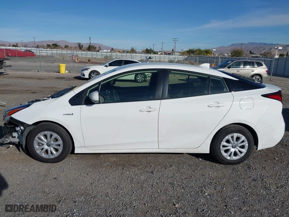 2021 Toyota Prius L Eco with VIN JTDKAMFU9M3150667, listed as a IAAI auction lot 41609328 with 59,177 mi miles. Bid and sale history available at carsss.com. Image 15.
