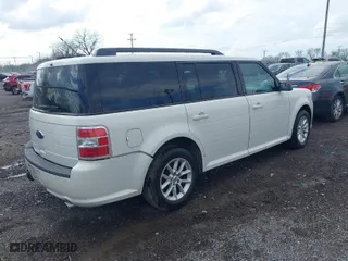 2014 Ford Flex SE with VIN 2FMGK5B89EBD13316, listed as a IAAI auction lot 41940672 with 128,885 mi miles. Bid and sale history available at carsss.com. Image 4.